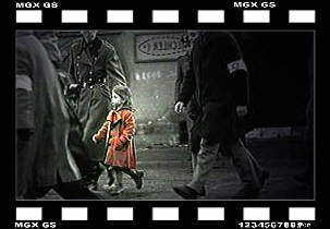 little girl in red dress in schindlers list